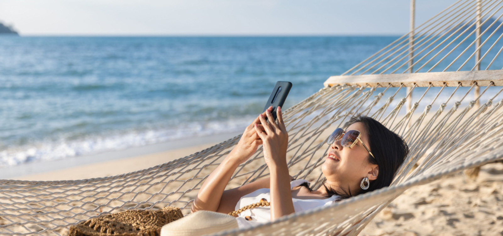 girl on a hammock on the beach